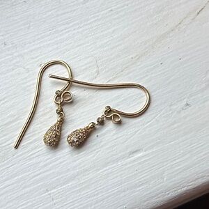 Delicate gold earrings